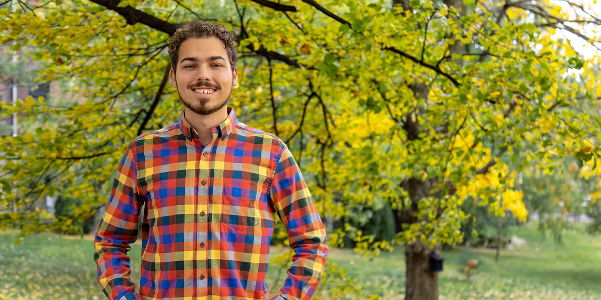 post baccalaureate teacher certification student poses outside