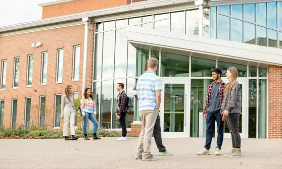 Students gathered outside on campus