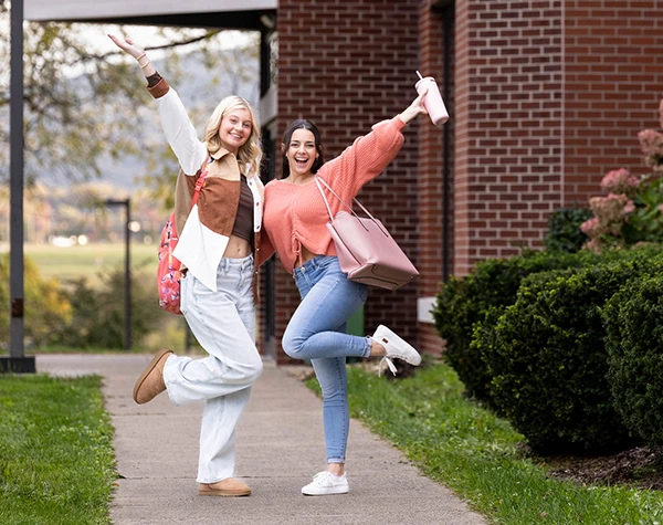 two college students excited about being on campus