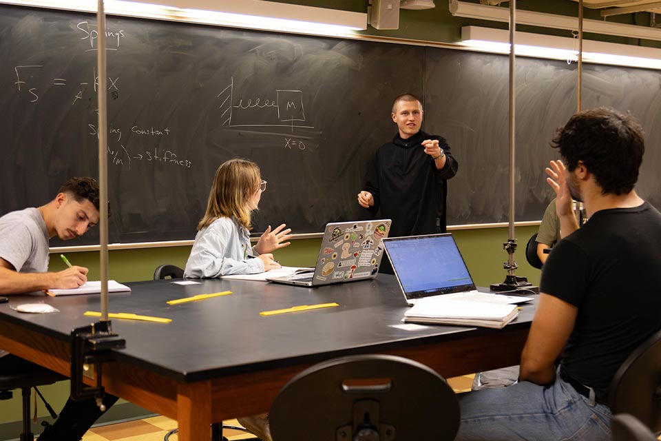 Benedictine monk teaching class at Saint Vincent