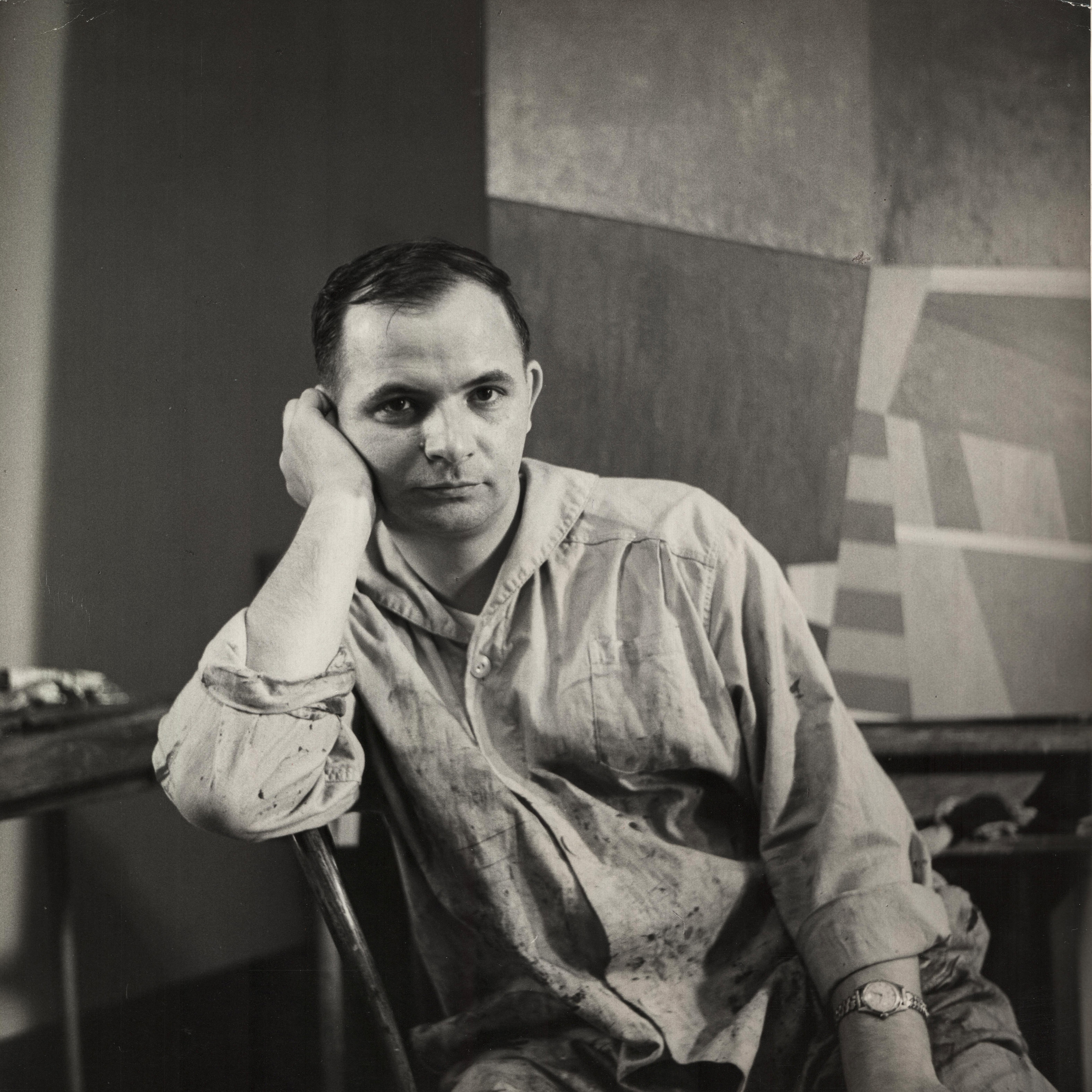 1. Verostko in his New York studio. Photo by Robert Lax, 1960.