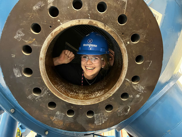 phot of Sydney Green inside a steam generator mockup at Westinghouse Electric