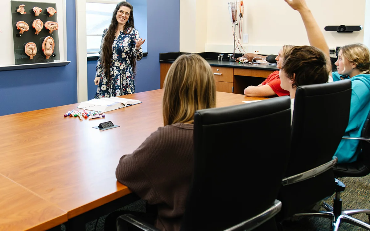 Dr. Mary Regina Boland explaining her research to nursing students at Saint Vincent College